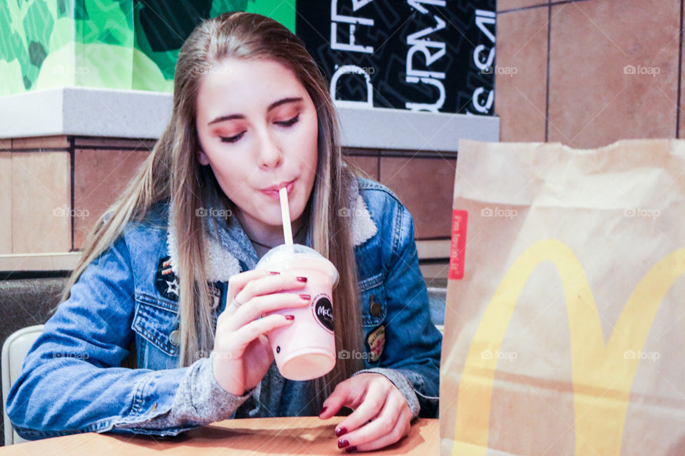 McDonald’s- enjoying a strawberry milkshake 