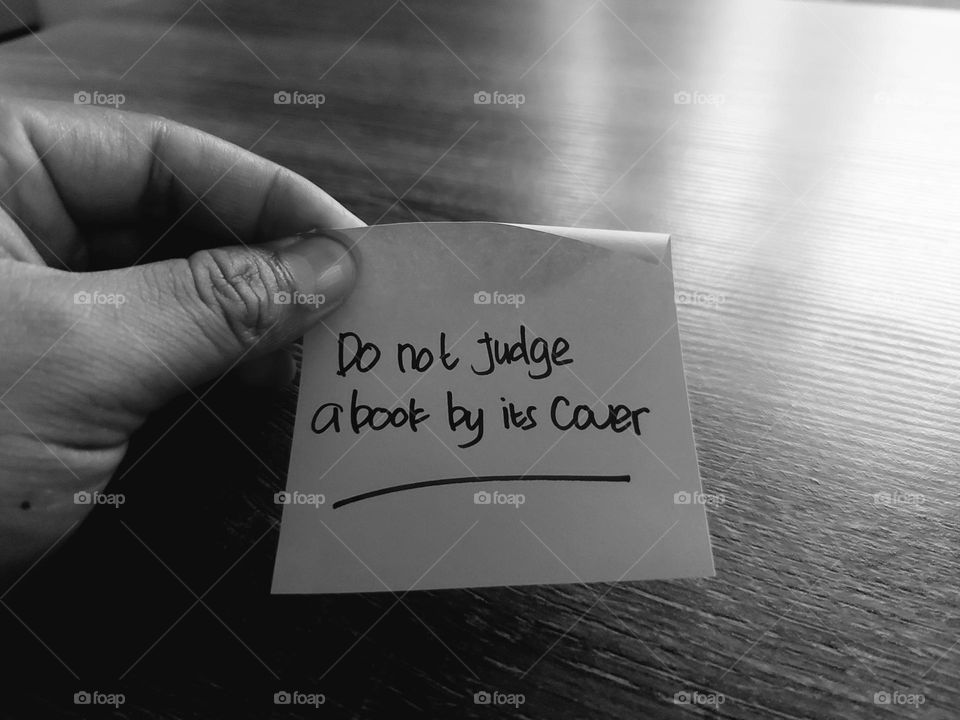 Motivational quotes on a small piece of paper