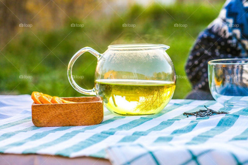 Jug containing with green tea