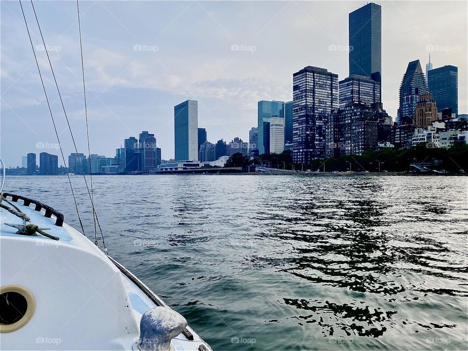 This is one of many beautiful impressions from the maiden voyage of our new boat, a “23 O’Day” from “Mamaroneck” to “Newtown Creek” along the “Upper East Side” of “Manhattan” on a hazy slightly overcast day in July of 2023. Hypnotic Productions