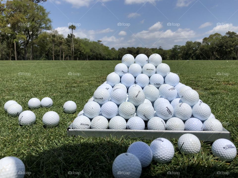 Pyramid of golf balls.