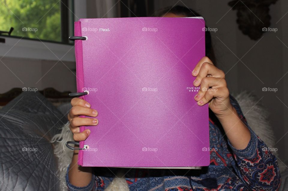 Five star binder being held