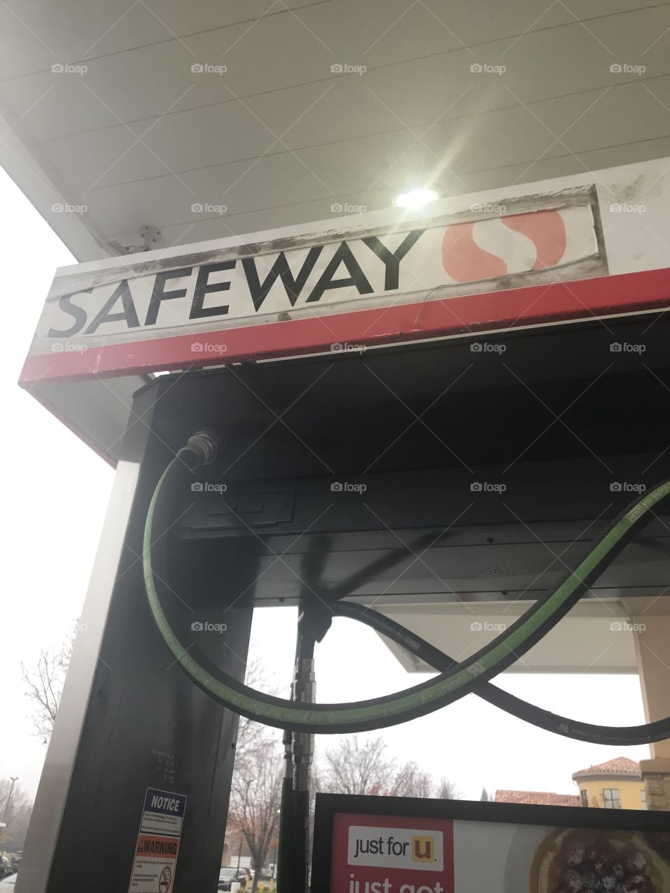 The Outside view of the Safe gas station fueling station located in USA, America .