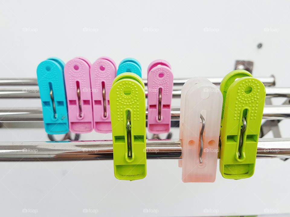 colorful plastic clothespins/ clothes pegs