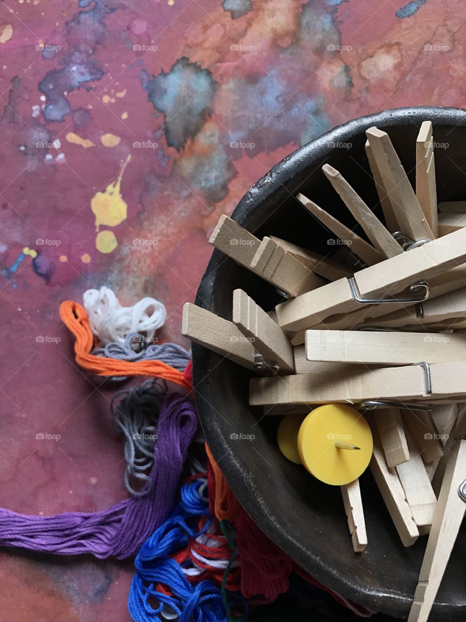 High angle view of clothespins and wools