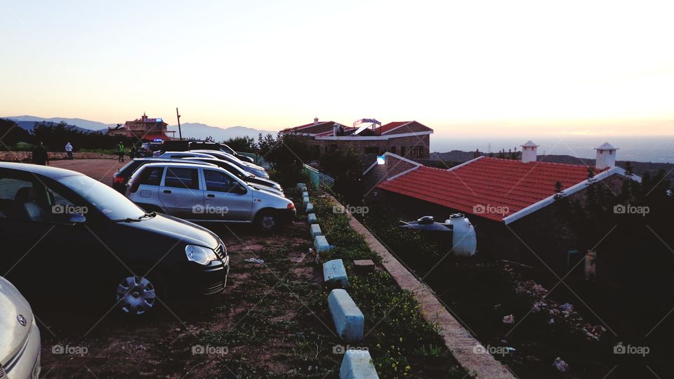 in front of a cafe's parking in the mountains above the town of Beni Mellal in the center of Morocco.