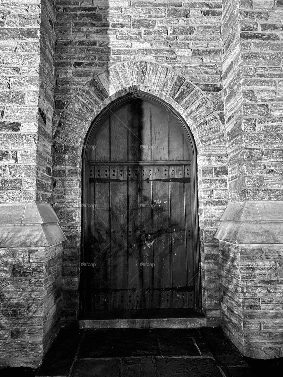 A door in a bell tower at night
