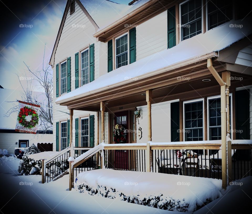 Snow covered home at Christmas 