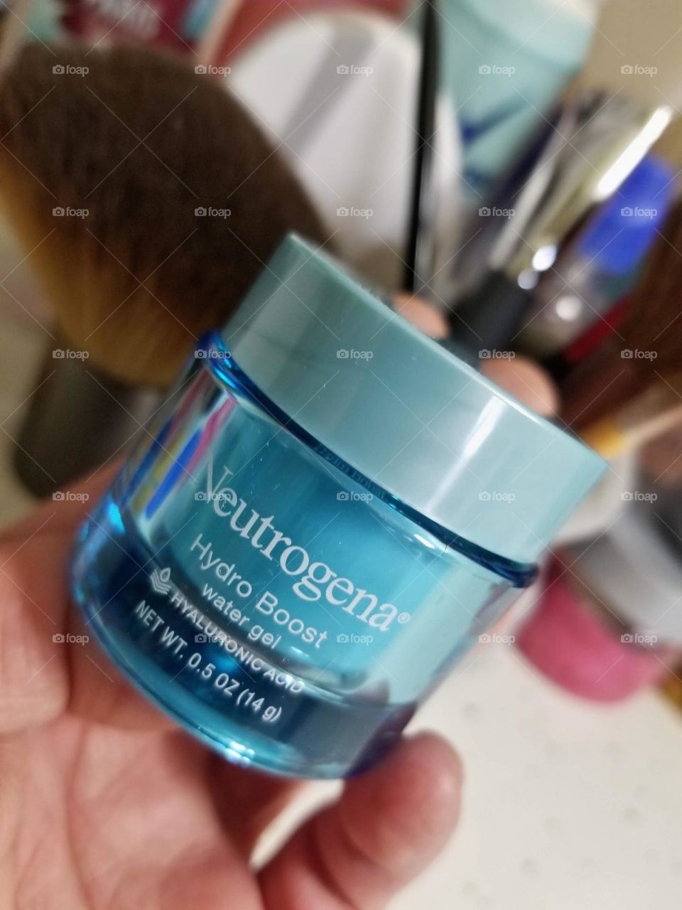 getting ready to put makeup on