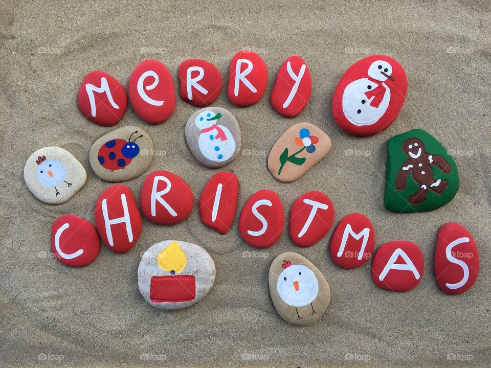 Merry Christmas on multicolored stones