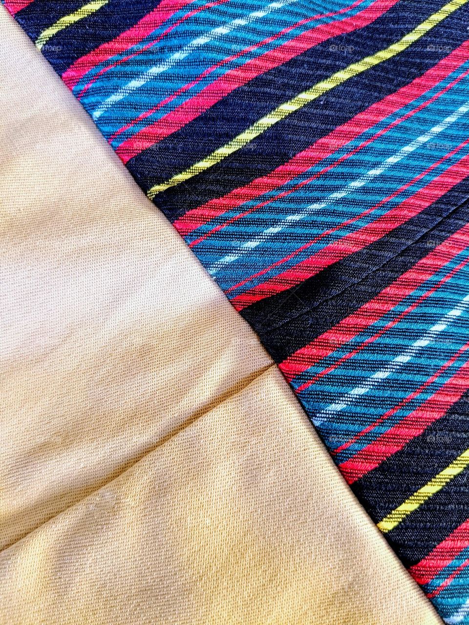 cross view of an old fabric patchwork. Reuse concept.