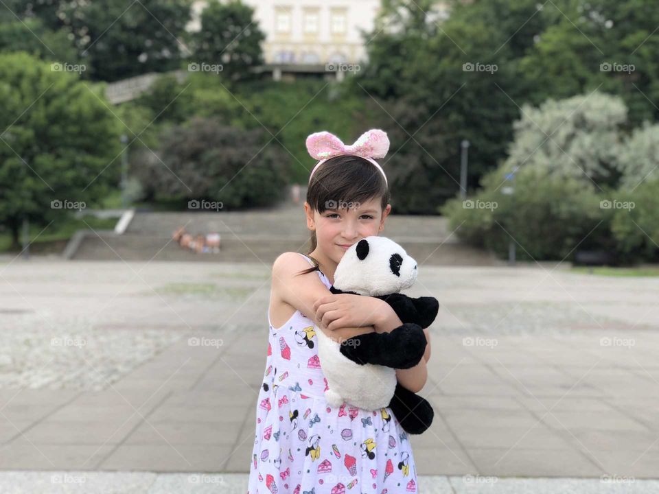 Little girl with teddy