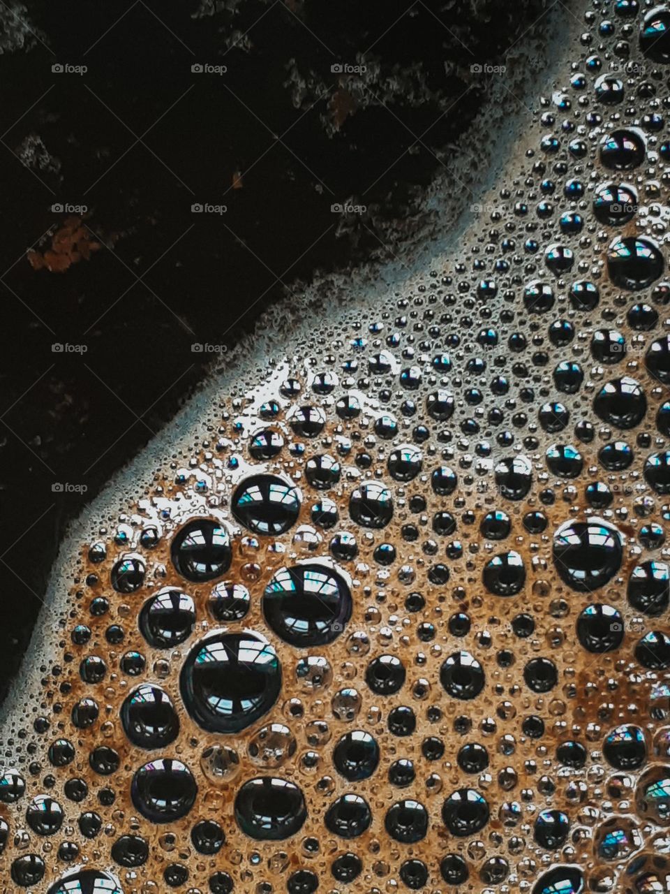 Macro photo of instant coffee foam in a cup
