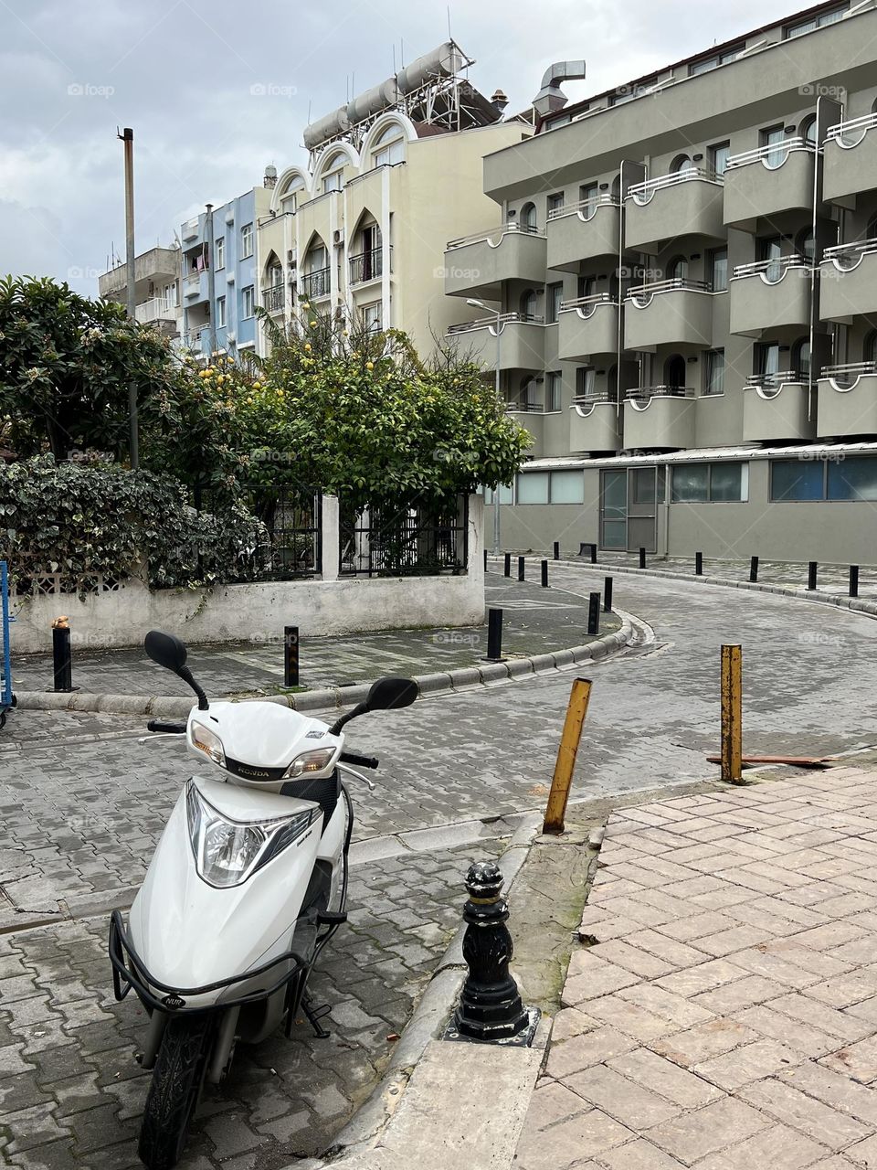 Streets of Marmaris. Grey buildings and a bike