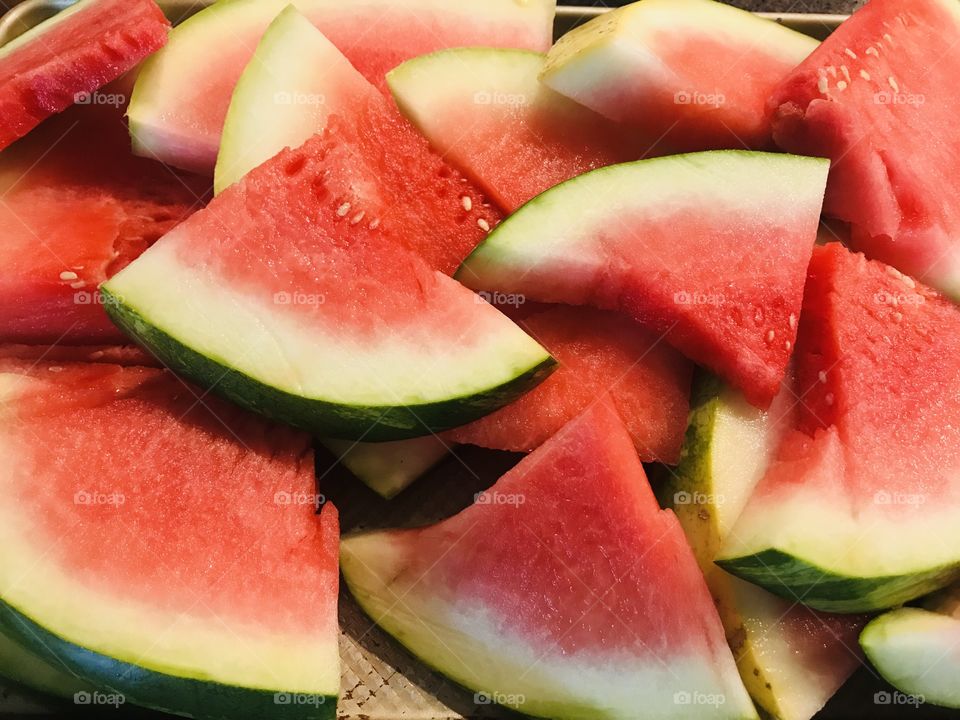 Delicious red juicy red watermelon is exactly what we like to eat on a warm sunny day! Yum!! 