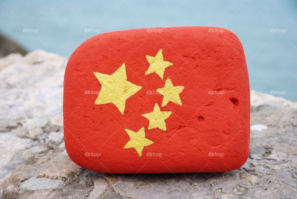 Flag of China on a stone