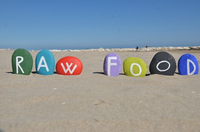 Raw food concept on colourful stonef