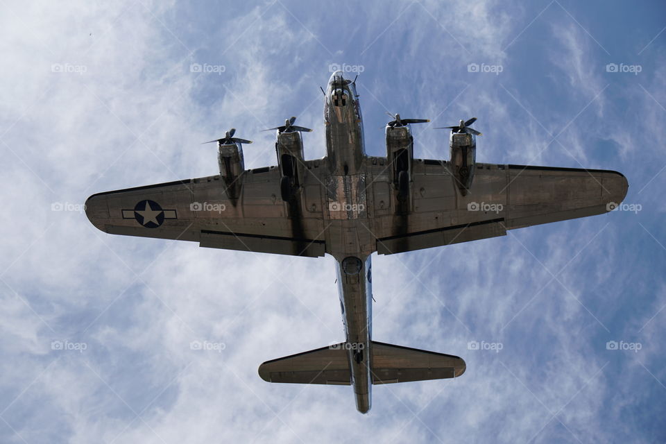 B17 Flying Fortress flies overhead on final approach