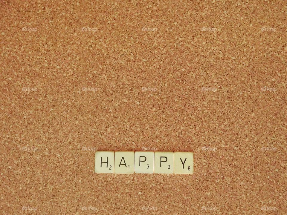 scrabble words on cork board