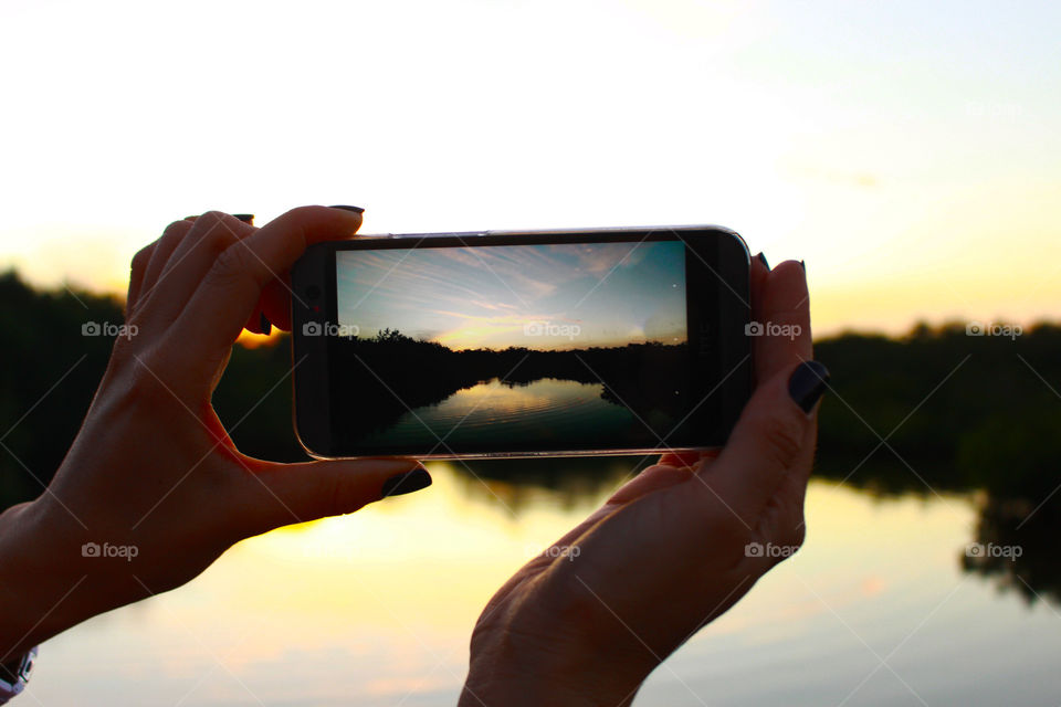 Taking a picture of sunset