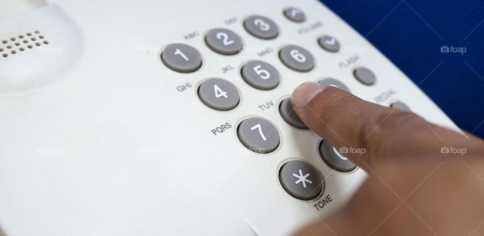 someone is dialing the number being called to make a call