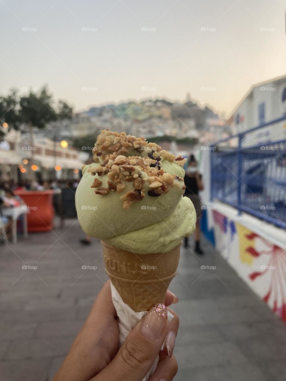 Sunset in Turkey. Blue sky and tall palm trees. Sunsets and sunny days. Summertime in Kusadasi. Vacation travel in Turkey . Summer view. Sunny day during vacation. Hidden gems and secret places.