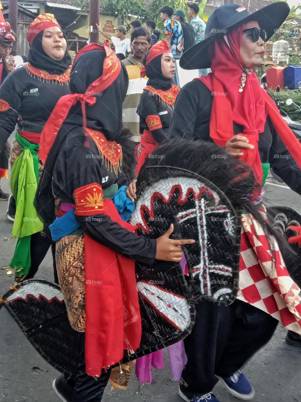 Jaran Kepang, Jaranan or Kuda Lumping is a folk art or dance involving horse riders (jaran) with toy horses made from woven bamboo strips that are arranged in such a way and then clamped between the dancer's two legs.