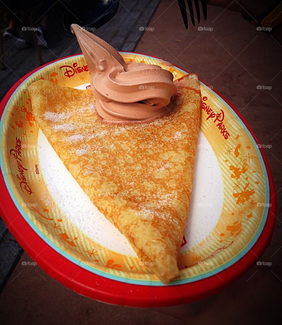 The perfect crepe with some ice cream on top.