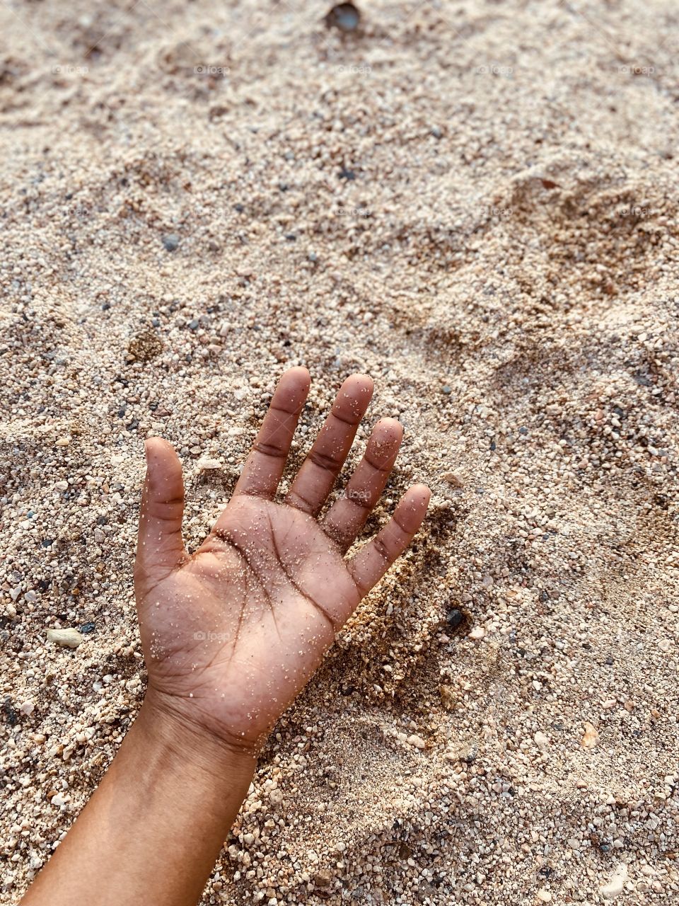 When we visited our village, my sister's first outing was playing with soil and water