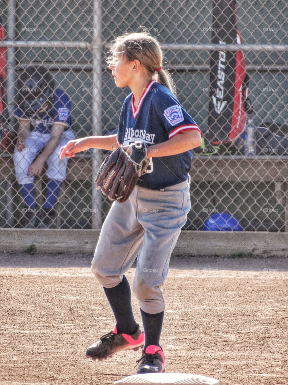 Girl Playing Little League Baseball