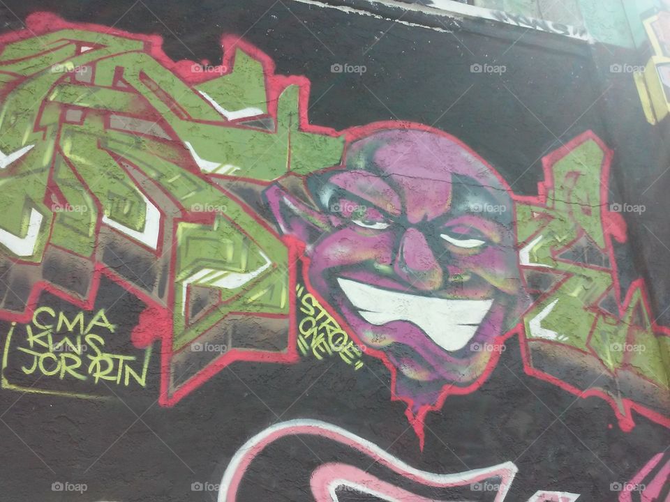 purple face. graffiti