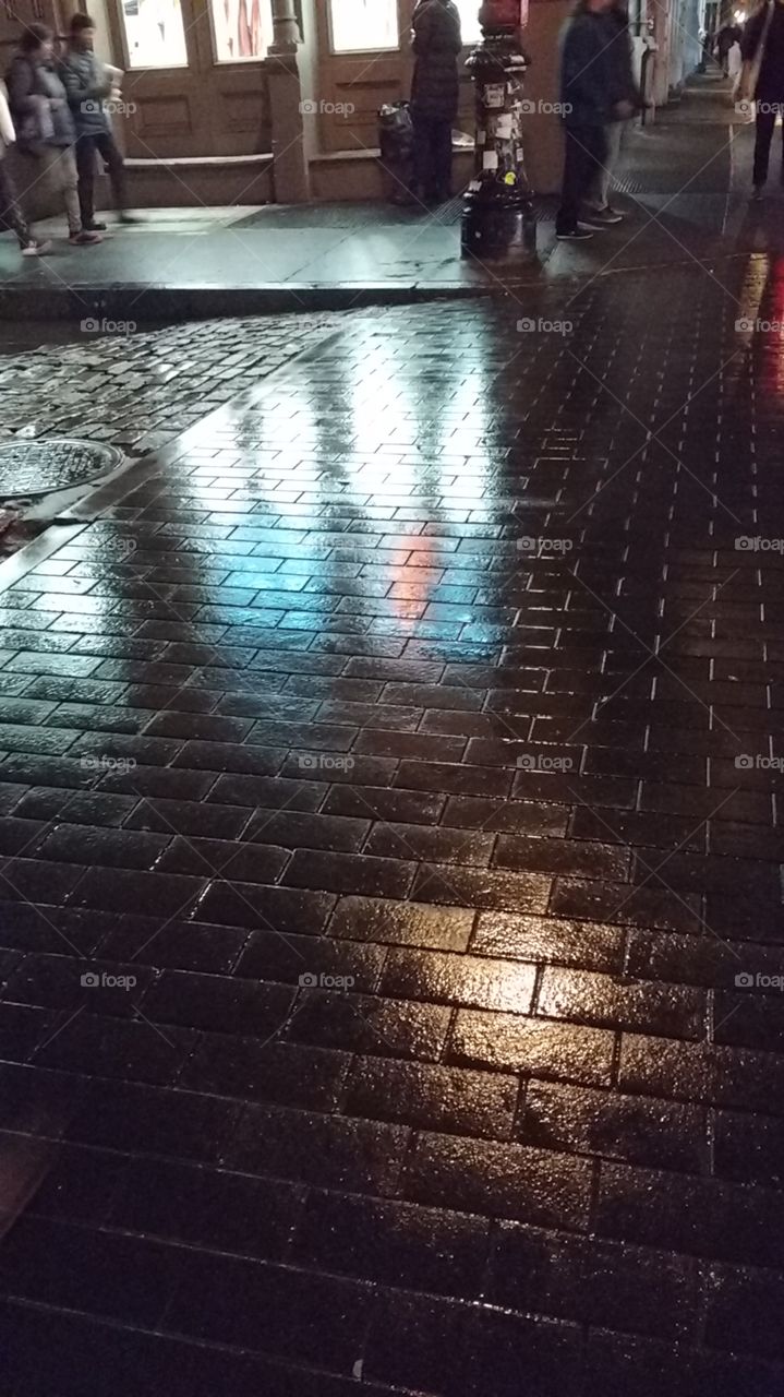 Corner Cobble stone street in Soho NYC after the rain