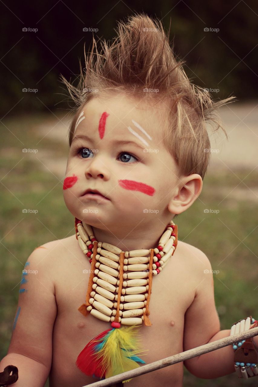 Cute boy with tribal dress up