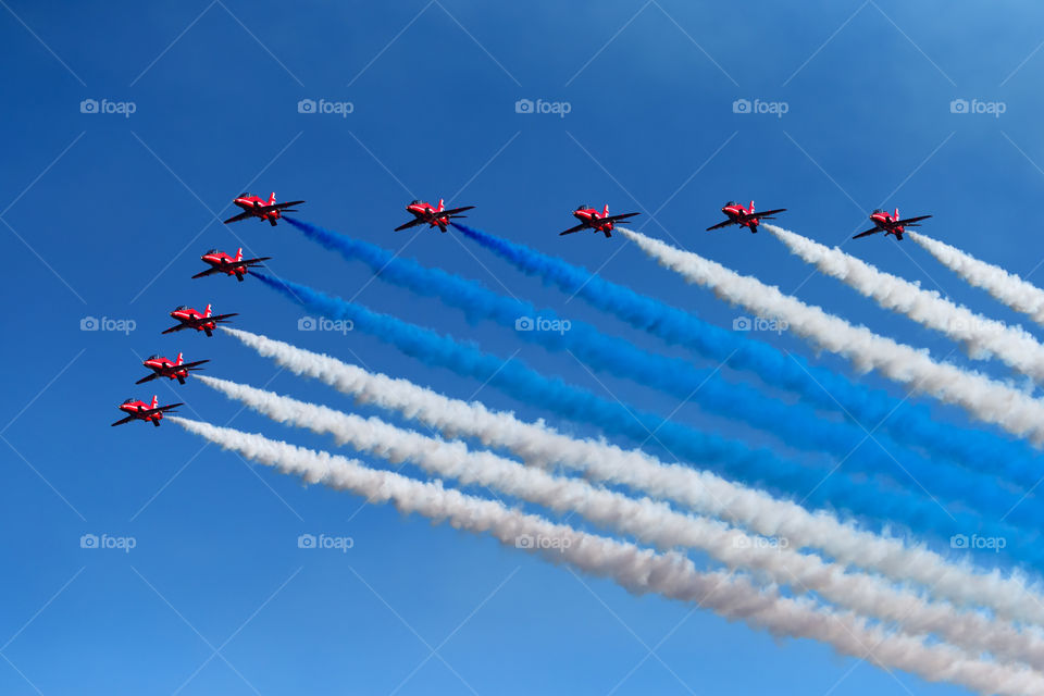 Helsinki, Finland - June 9, 2017: Red Arrows (The Royal Air Force Aerobatic Team) flying aerobatics at the Kaivopuisto Air Show in Helsinki, Finland on 9 June 2017.