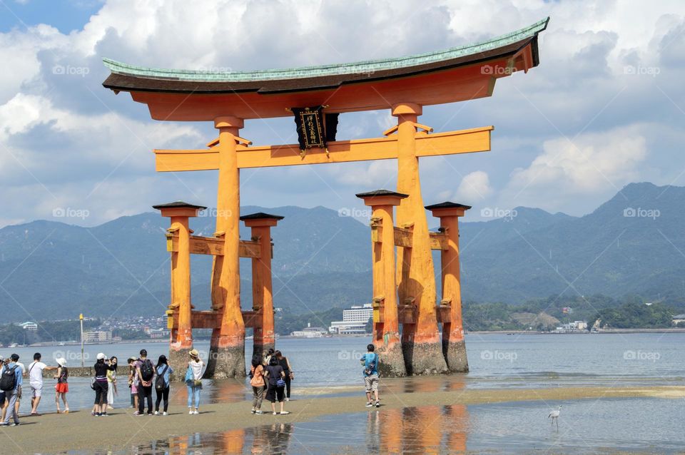 People At The Torii From The Itsukushima Shrine At Miyajima Japan 25-6-2016