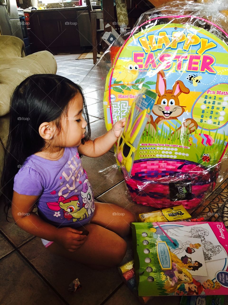 Opening her Easter gifts