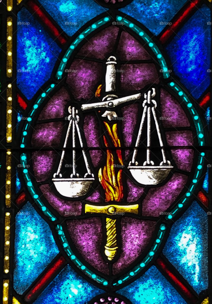 Firey Sword and scales of justice 