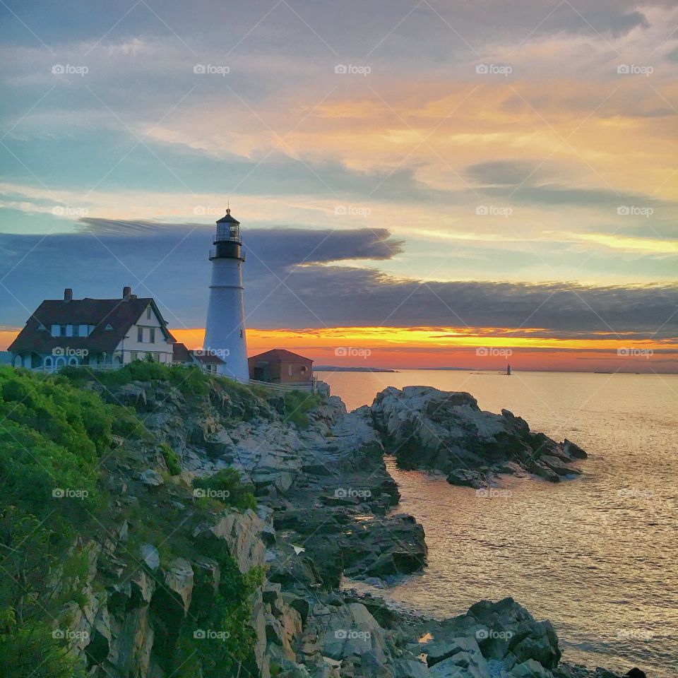 Dawn breaks over Portland Head Light 