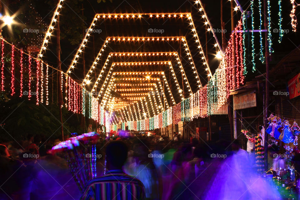 a busy street during a festival time in India