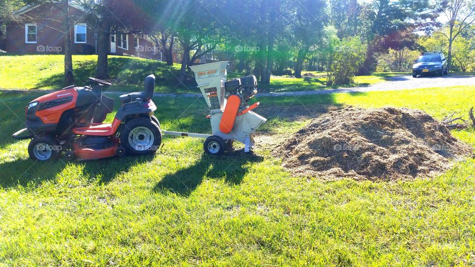 Doing some yard work, mulching brush