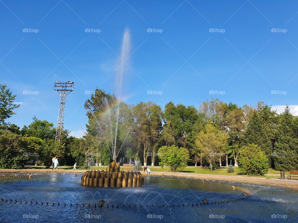 fontain with a rainbow