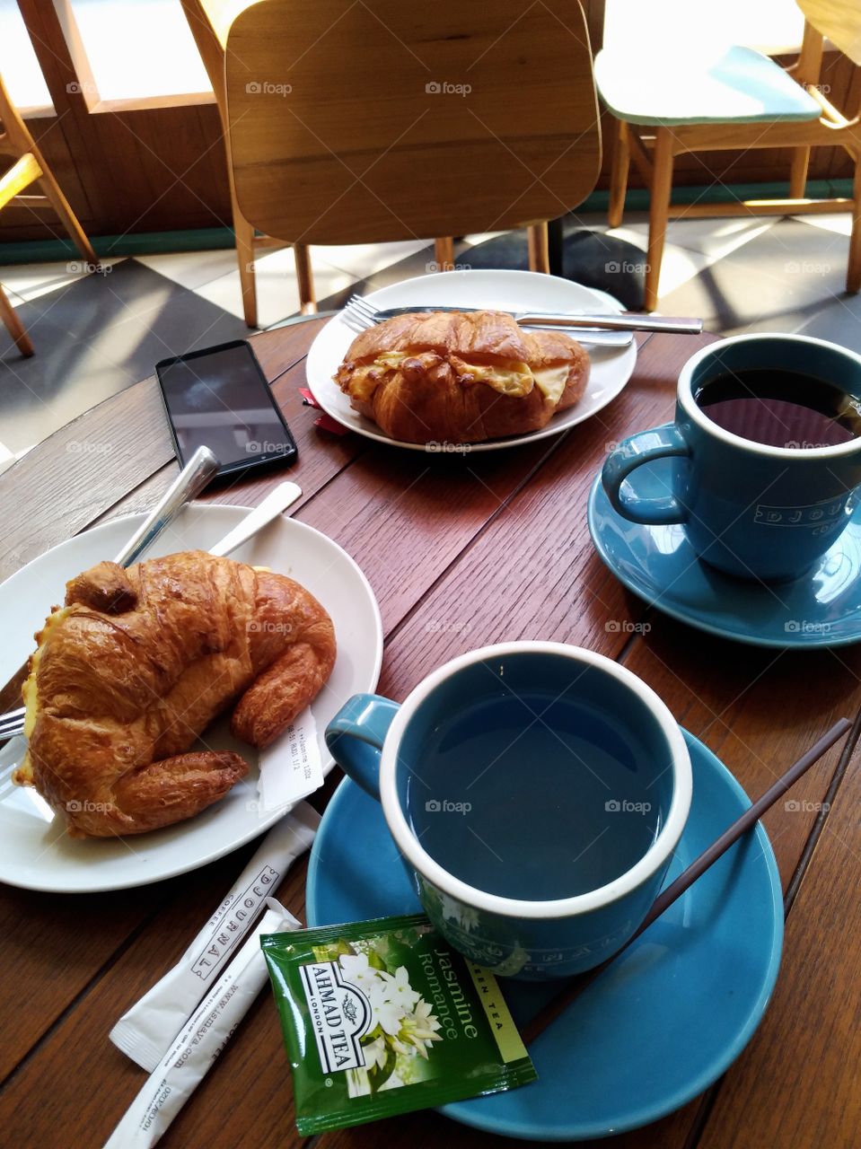 Breakfast for two with croissants and tea