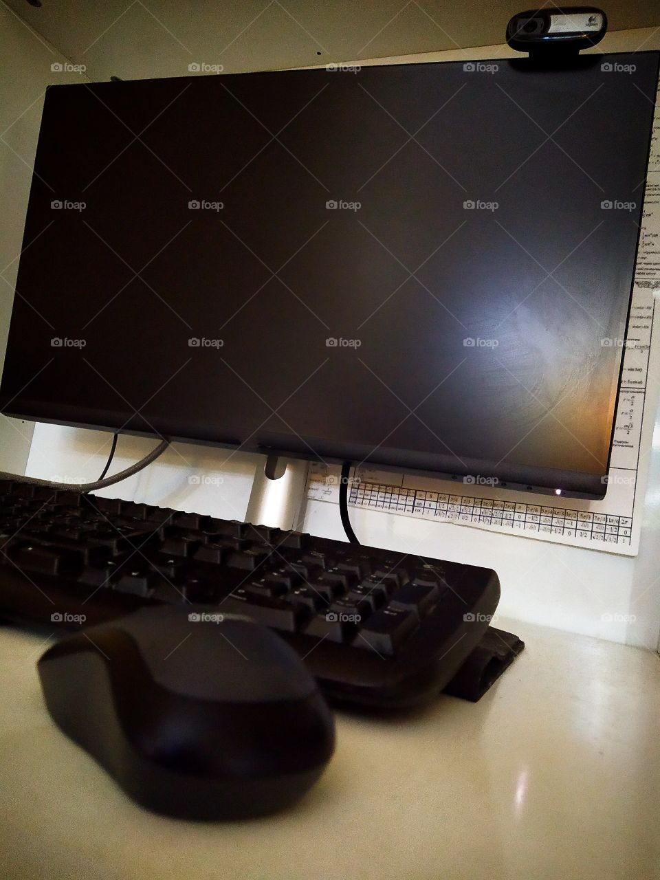 Black objects: monitor, keyboard and computer mouse