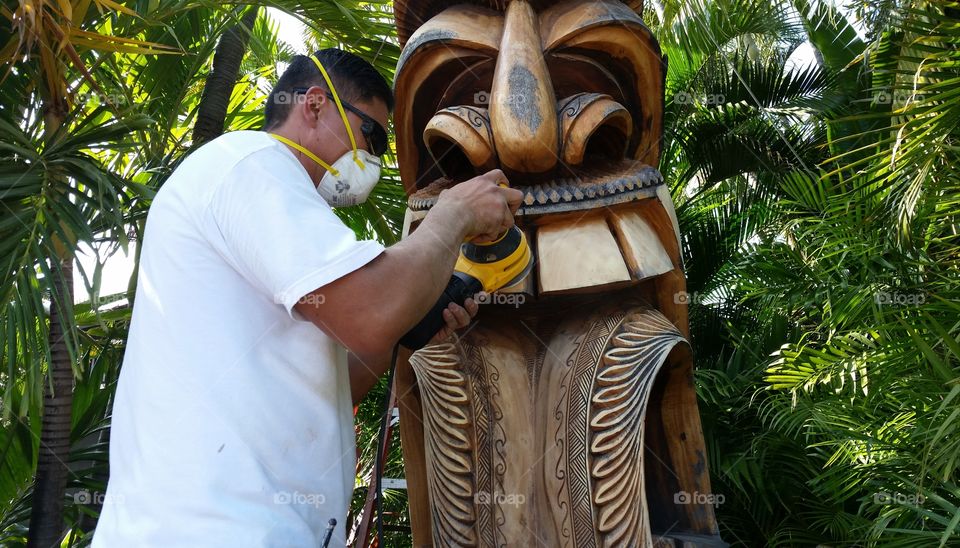 Dental work on my favorite tiki man at work. Kaanapali Maui.