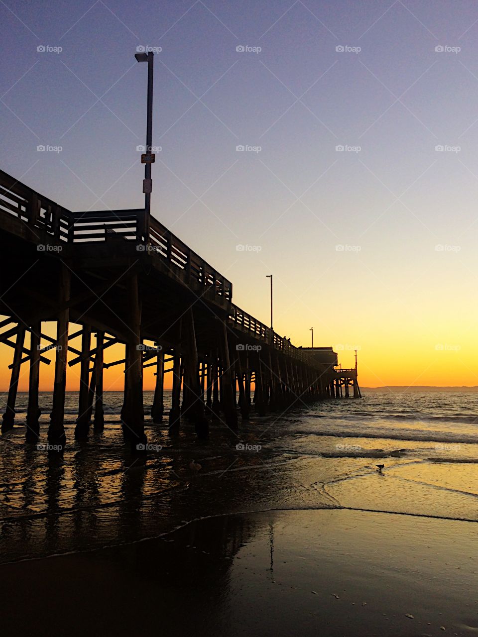 Scenic view of pier during sunset