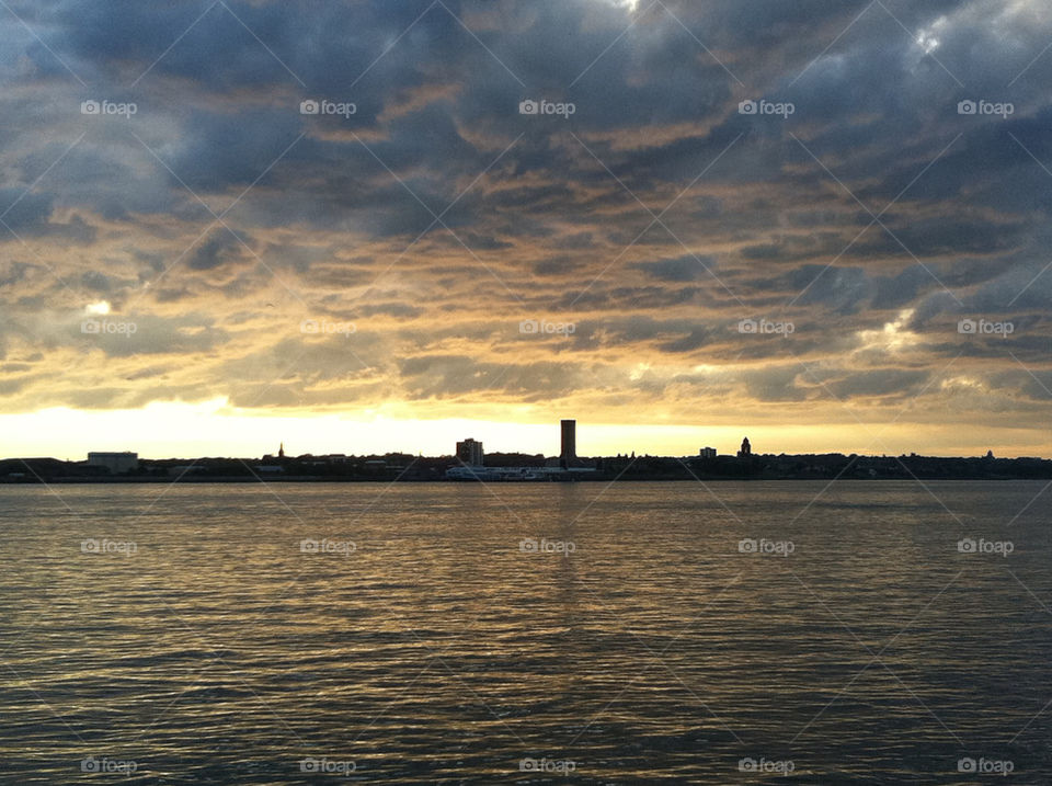 sunset clouds river liverpool by jeanello