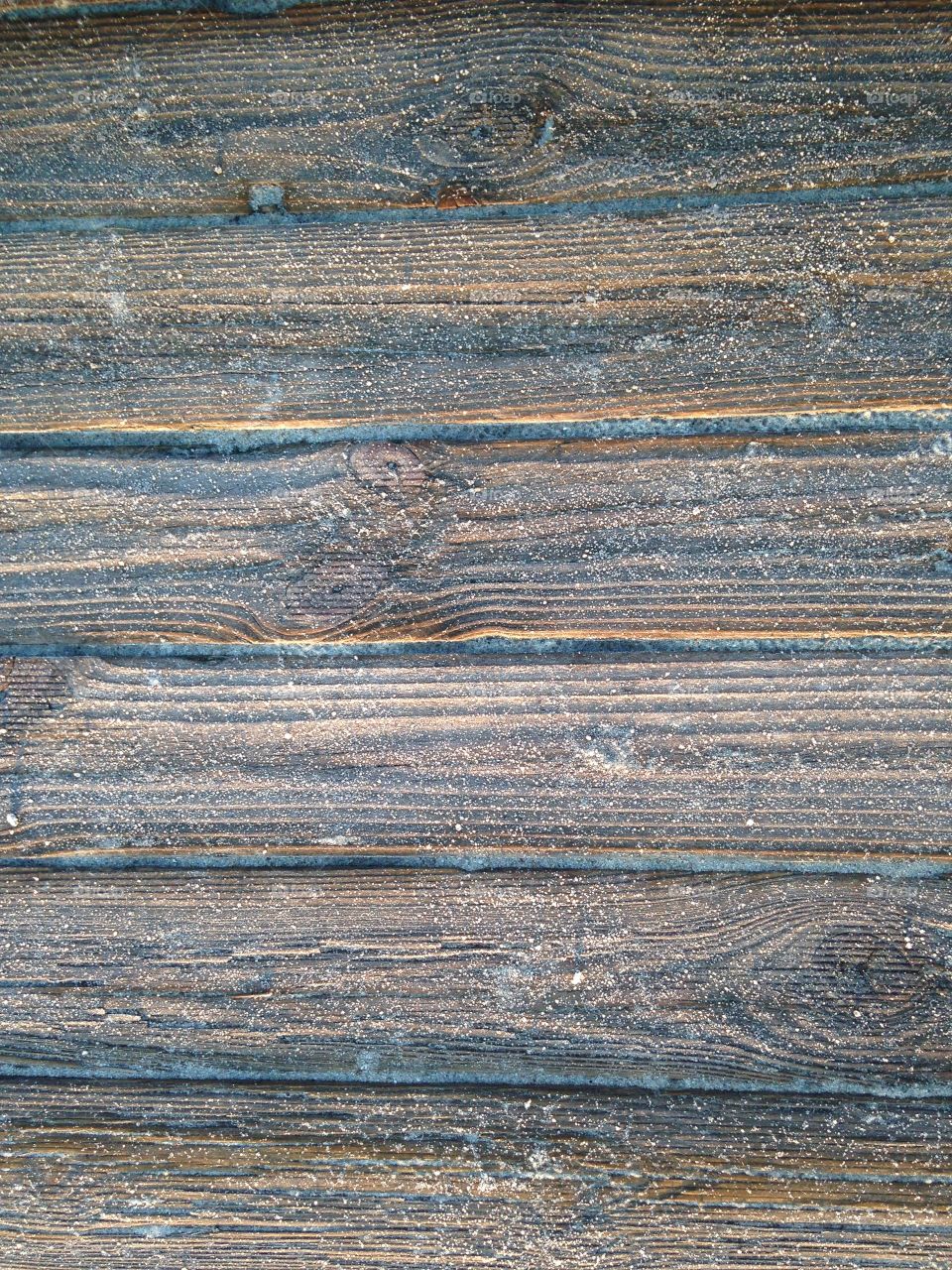 wooden pier in winter closeup