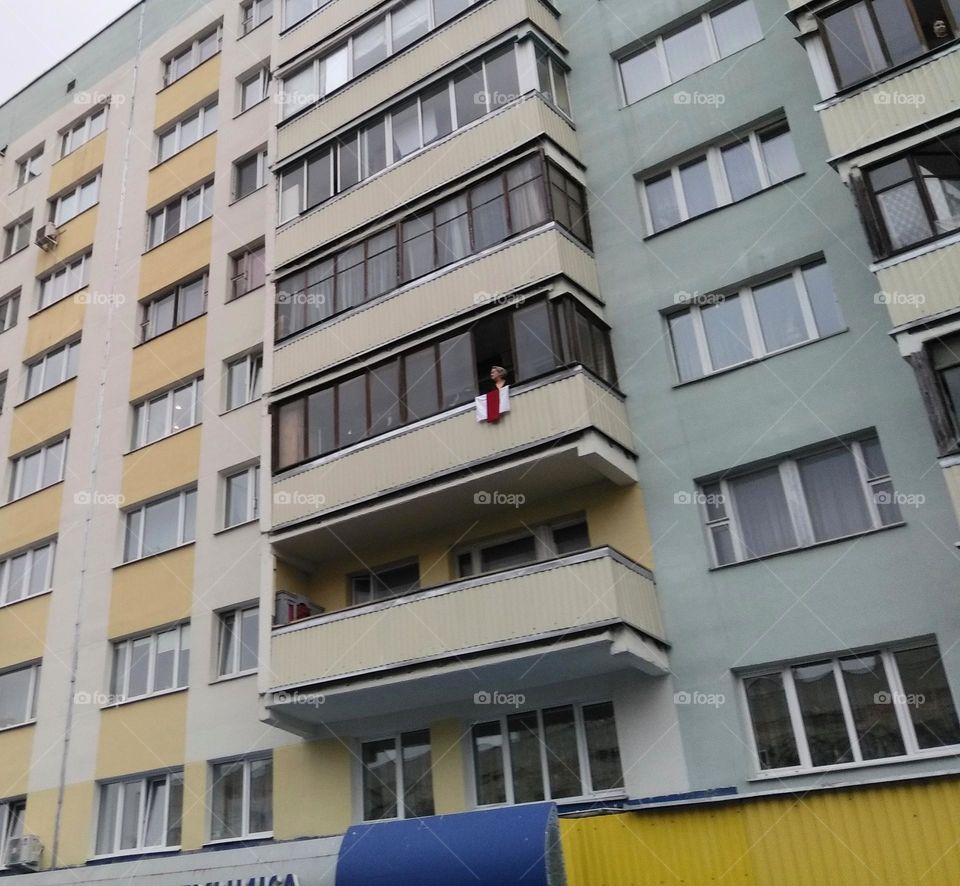 street view house and person with national flag, Belarusian protest