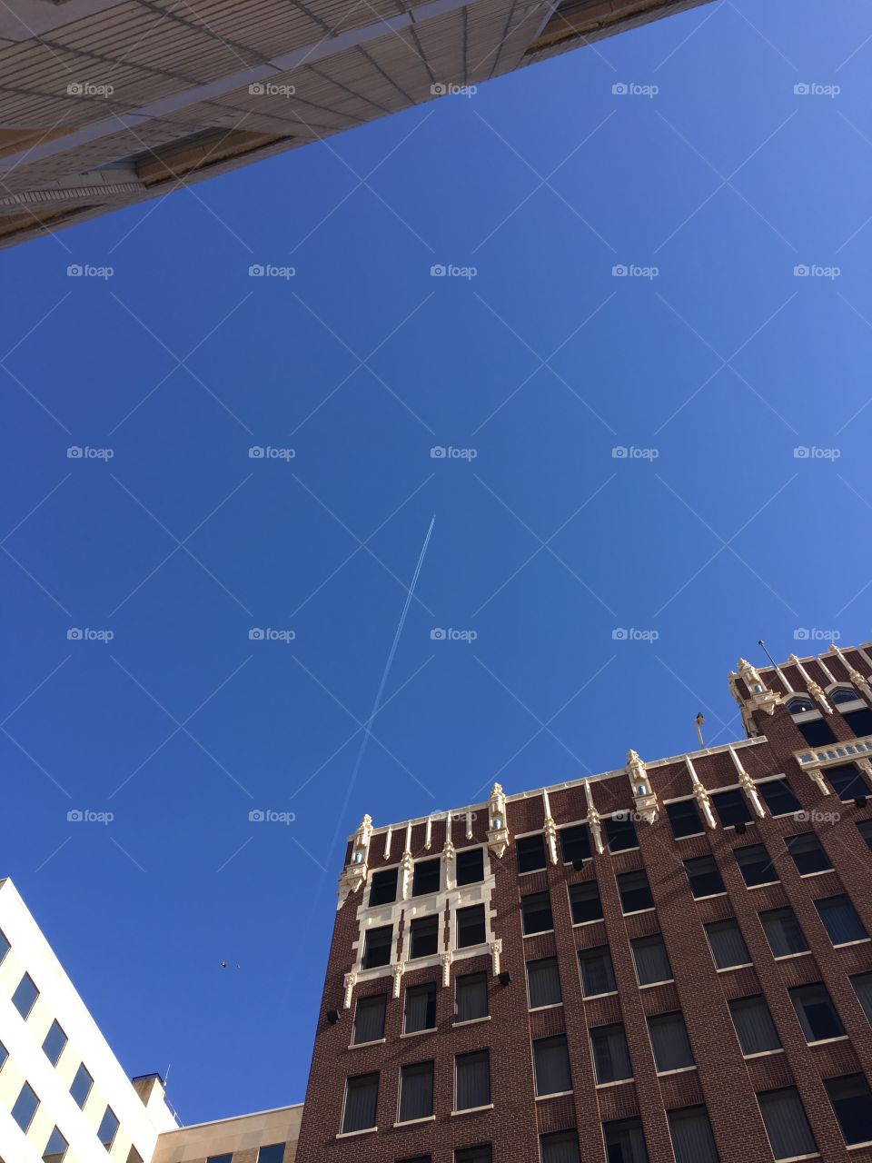 This is a picture that I took of a airplane that was flying overhead during my lunch break 