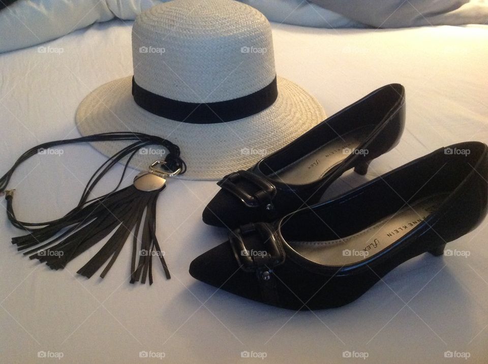 Shoes, hat and necklace.